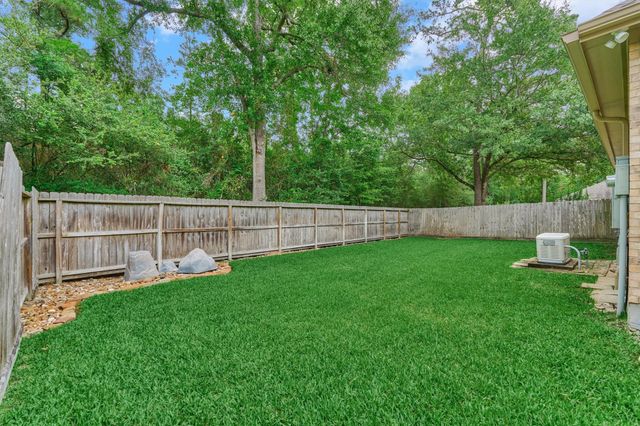 18 Coachman Ridge Place, The Woodlands, TX 77382