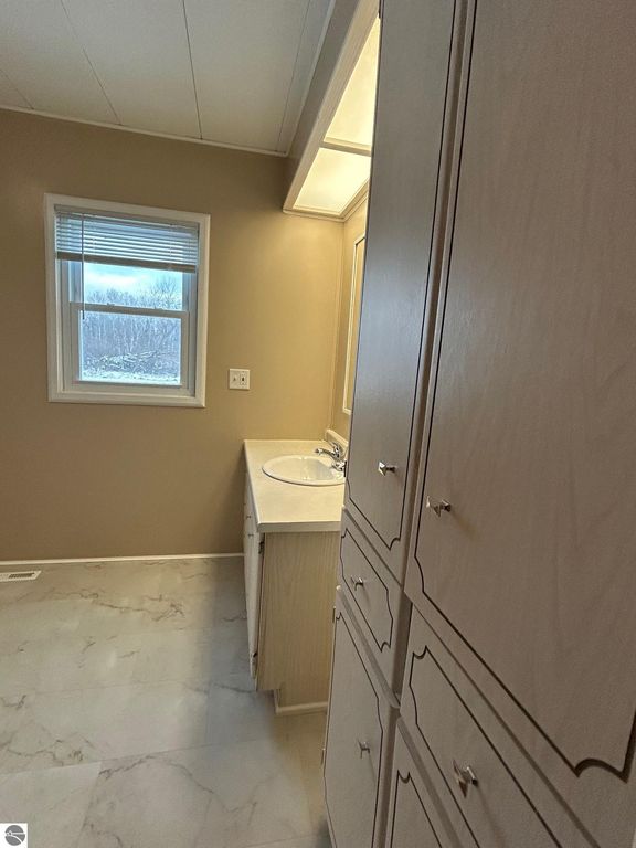 Image 15 of property listing at 5614 Cavender Drive, Shepherd, MI 48883