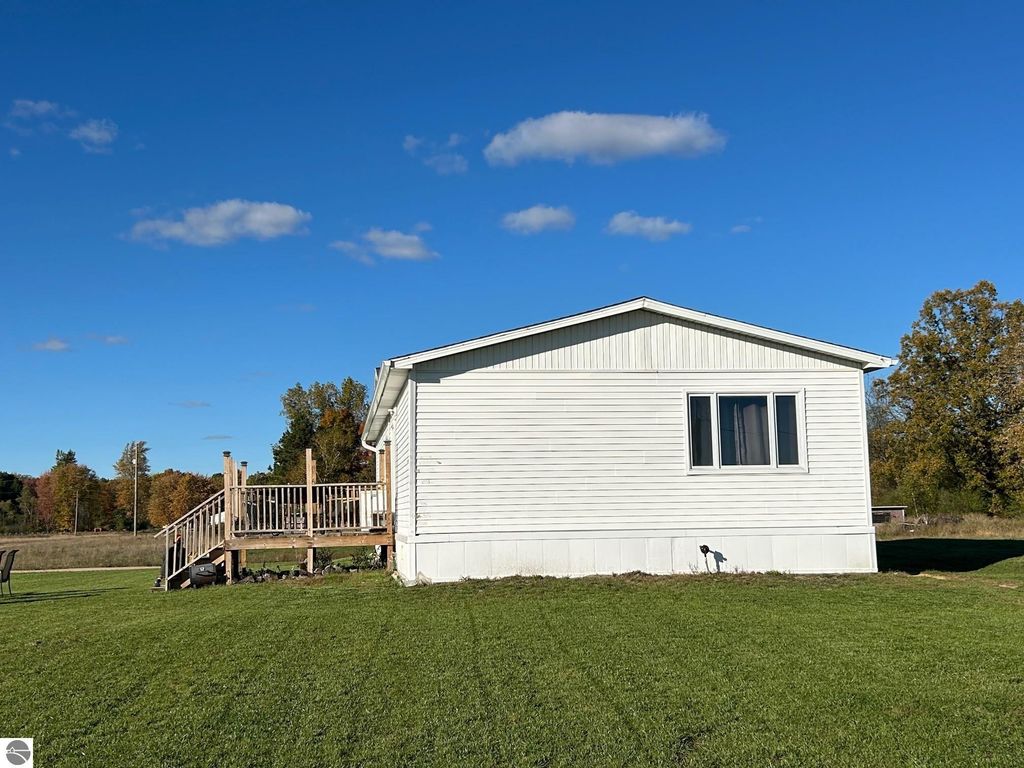 Image 2 of property listing at 5614 Cavender Drive, Shepherd, MI 48883