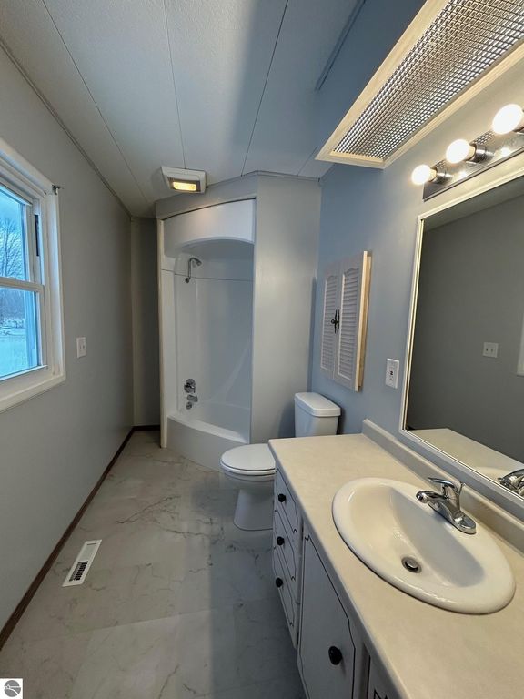 Image 21 of property listing at 5614 Cavender Drive, Shepherd, MI 48883