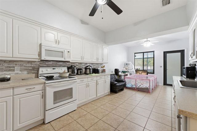 1421-1419 SW 76 ct, Miami, FL 33144