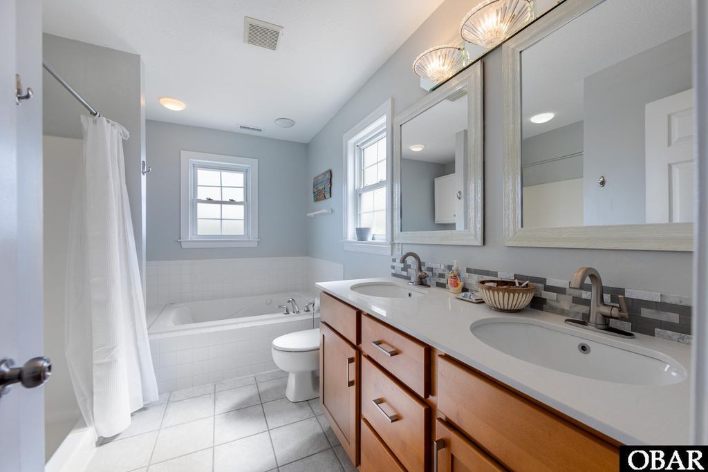 Image 20 of property listing at 112 Sandpebble Court, Nags Head, NC 27959