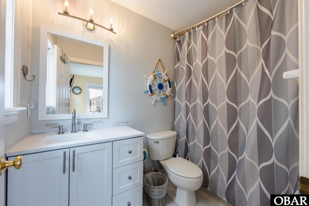 Image 25 of property listing at 112 Sandpebble Court, Nags Head, NC 27959