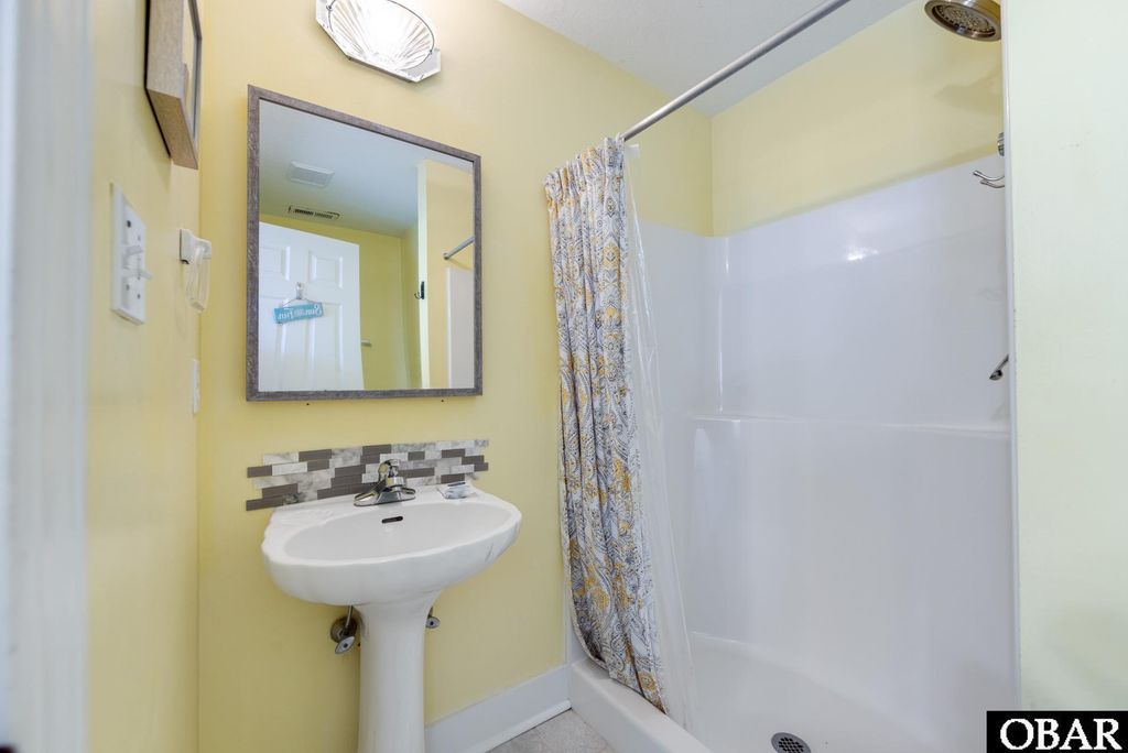 Image 43 of property listing at 112 Sandpebble Court, Nags Head, NC 27959