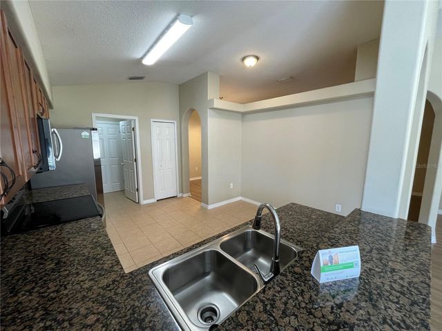 7128 ROYAL GEORGE COURT, Wesley Chapel, FL 33545