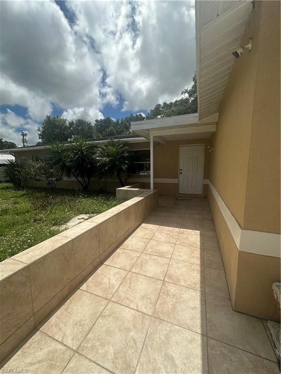 904 LEELAND HIGHTS BLVD, LEHIGH ACRES, FL 33936 — photo 2