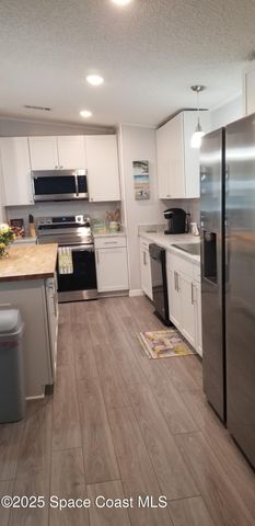 843 Sapodilla Drive, Barefoot Bay, FL 32976