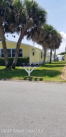 843 Sapodilla Drive, Barefoot Bay, FL 32976