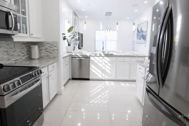 8537 NW 39th Court, Cooper City, FL 33024