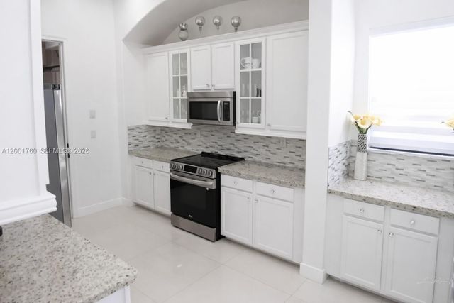 8537 NW 39th Court, Cooper City, FL 33024