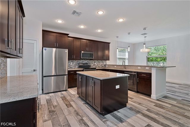 8645 Pegasus DR, Lehigh Acres, FL 33971
