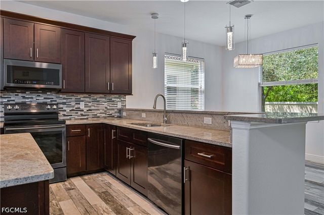 8645 Pegasus DR, Lehigh Acres, FL 33971