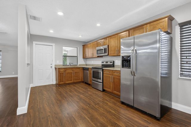 102 Meadowlark Drive, Royal Palm Beach, FL 33411