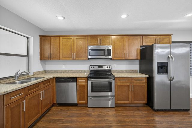 102 Meadowlark Drive, Royal Palm Beach, FL 33411