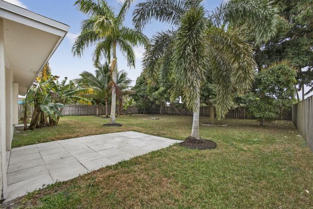 102 Meadowlark Drive, Royal Palm Beach, FL 33411