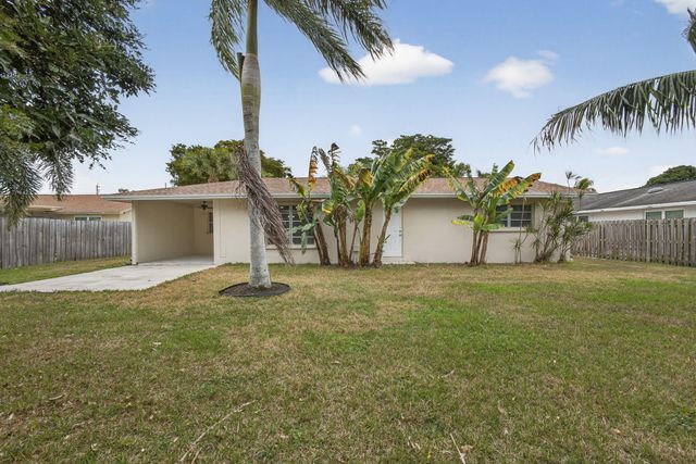 102 Meadowlark Drive, Royal Palm Beach, FL 33411