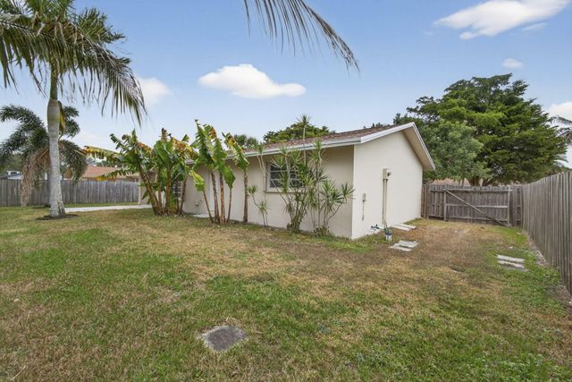 102 Meadowlark Drive, Royal Palm Beach, FL 33411