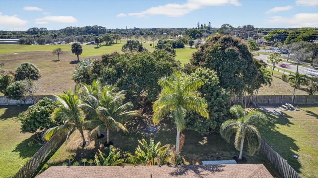 102 Meadowlark Drive, Royal Palm Beach, FL 33411