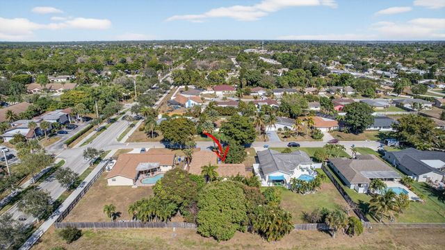 102 Meadowlark Drive, Royal Palm Beach, FL 33411