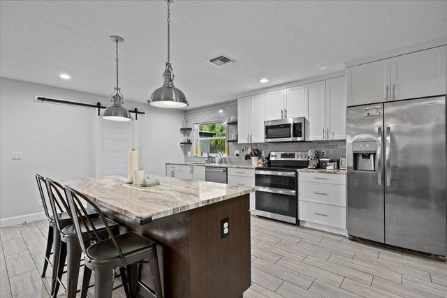 208 Sandpiper Avenue, Royal Palm Beach, FL 33411