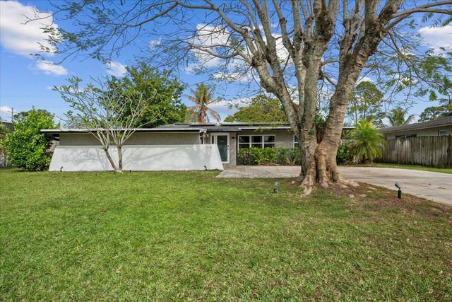 208 Sandpiper Avenue, Royal Palm Beach, FL 33411