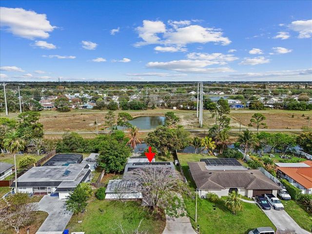 208 Sandpiper Avenue, Royal Palm Beach, FL 33411