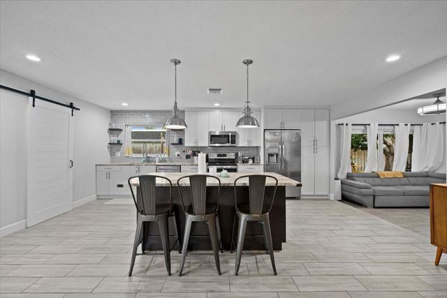 208 Sandpiper Avenue, Royal Palm Beach, FL 33411