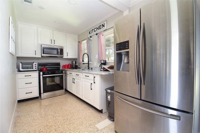 7716 E COMANCHE AVENUE, Tampa, FL 33610