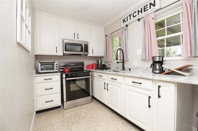 7716 E COMANCHE AVENUE, Tampa, FL 33610