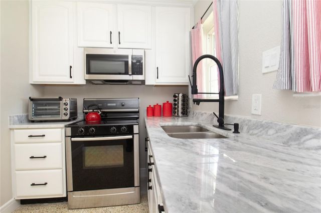 7716 E COMANCHE AVENUE, Tampa, FL 33610