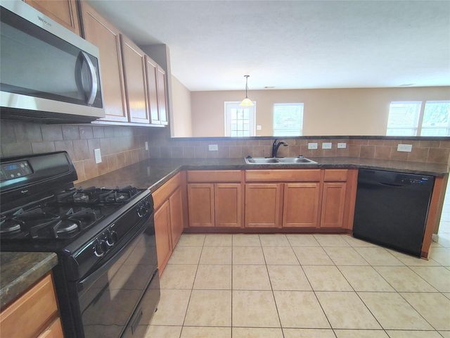 1206 Larks Trace Lane, Houston, TX 77090