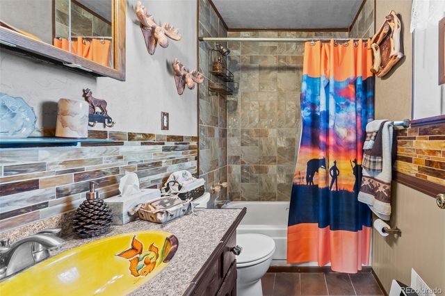 888 W Longbow Drive, Jefferson, CO 80456