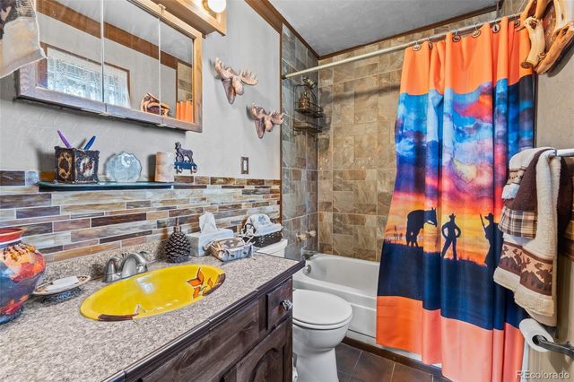 888 W Longbow Drive, Jefferson, CO 80456