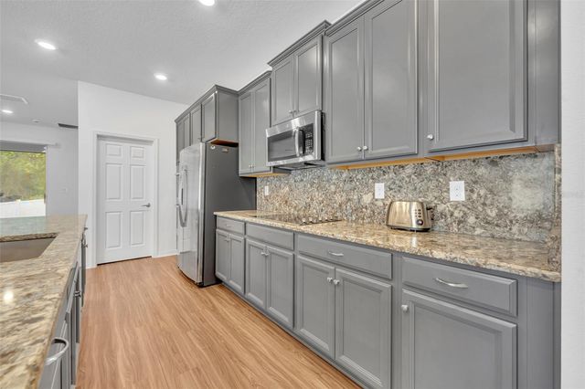 4249 BEARGRASS STREET, Clermont, FL 34714