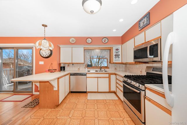 15 Lourae Drive, Massapequa Park, NY 11762