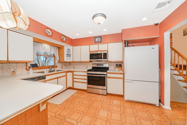 15 Lourae Drive, Massapequa Park, NY 11762