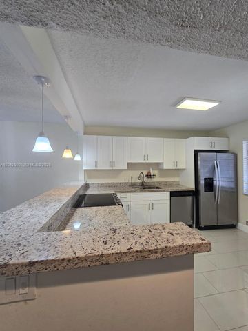 16581 Blatt Blvd 104, Weston, FL 33326