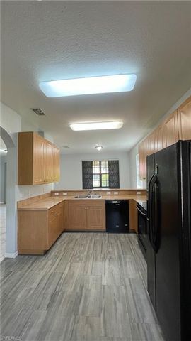 7385 Bristol CIR, Naples, FL 34120