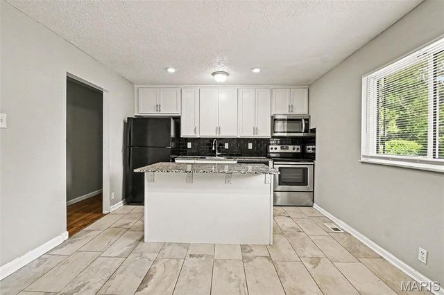 2535 Black Pine Court, Florissant, MO 63031