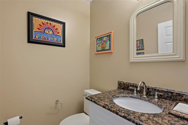 85 Woodlake Drive W, Woodbury, NY 11797