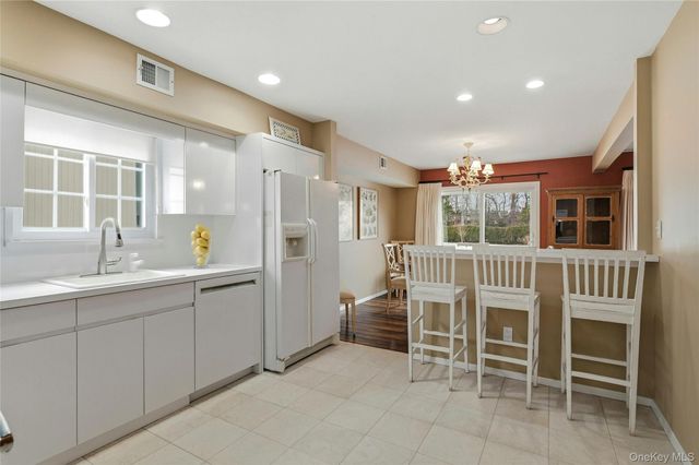 85 Woodlake Drive W, Woodbury, NY 11797