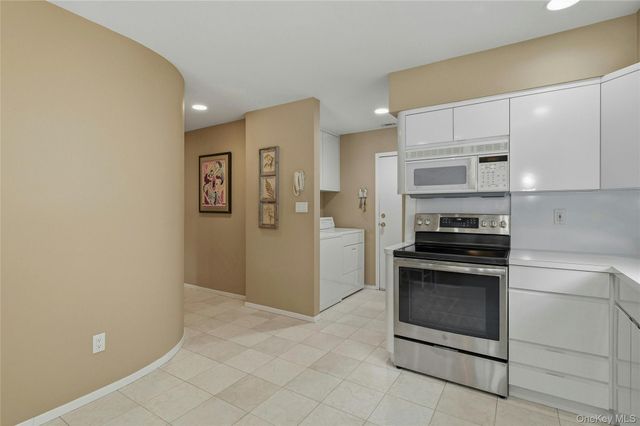 85 Woodlake Drive W, Woodbury, NY 11797