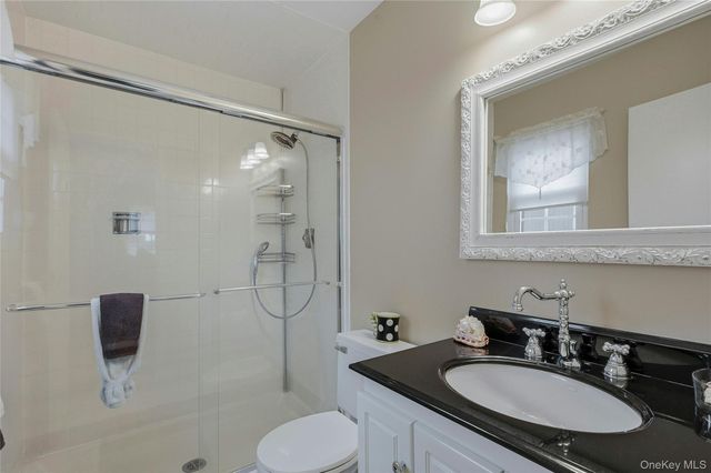 85 Woodlake Drive W, Woodbury, NY 11797