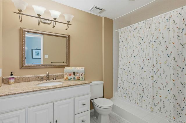 85 Woodlake Drive W, Woodbury, NY 11797