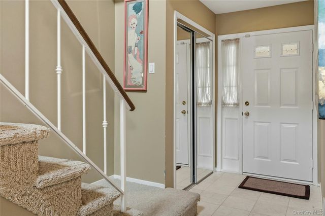 85 Woodlake Drive W, Woodbury, NY 11797