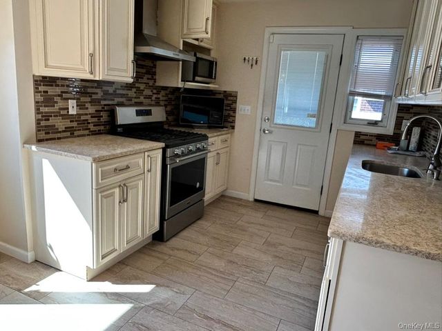 67 Emerson Avenue, Levittown, NY 11756