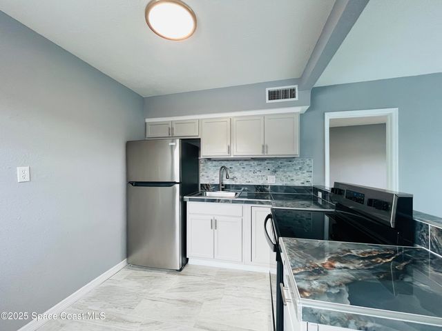 402 Adams Avenue E, Cape Canaveral, FL 32920