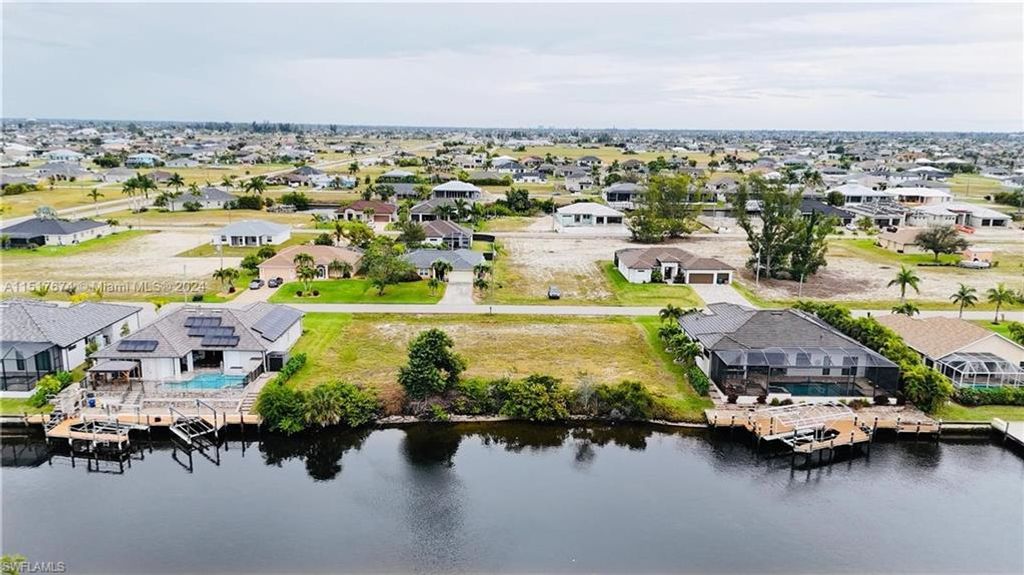 718 NW 38th PL, CAPE CORAL, FL 33993 — exterior