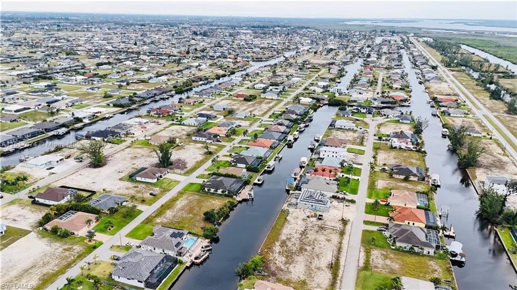 718 NW 38th PL, CAPE CORAL, FL 33993 — photo 2