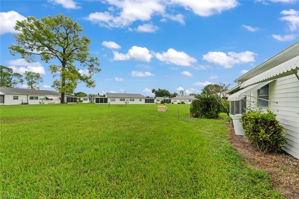 16 Dawn Flower CIR, LEHIGH ACRES, FL 33936 — photo 5
